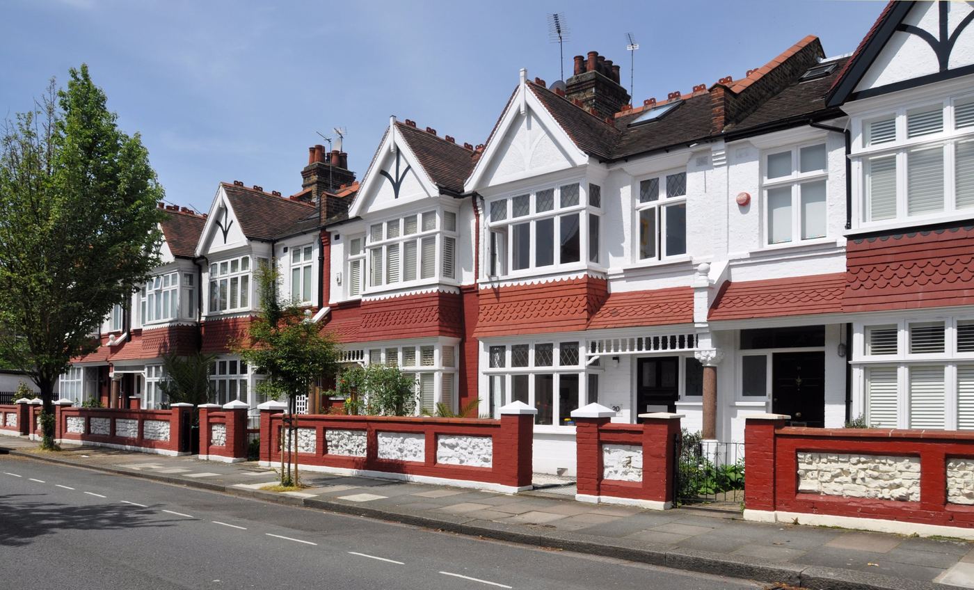 A tree-lined street of Edwardian terraced houses